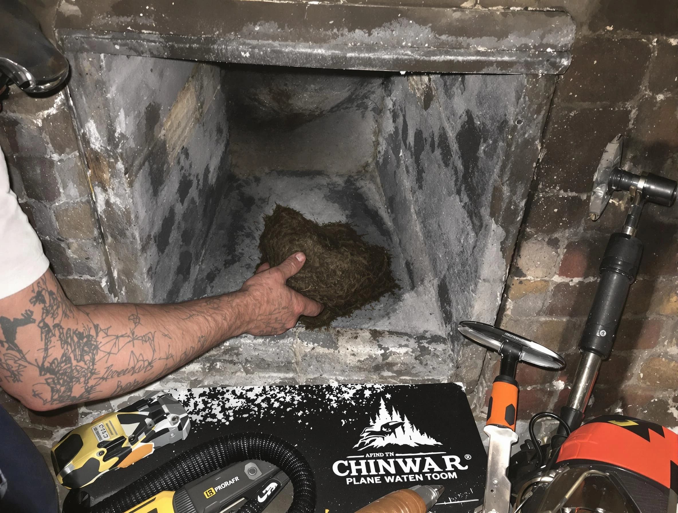 Centerville Chimney Sweep safely removing debris and screening chimney in Centerville, UT