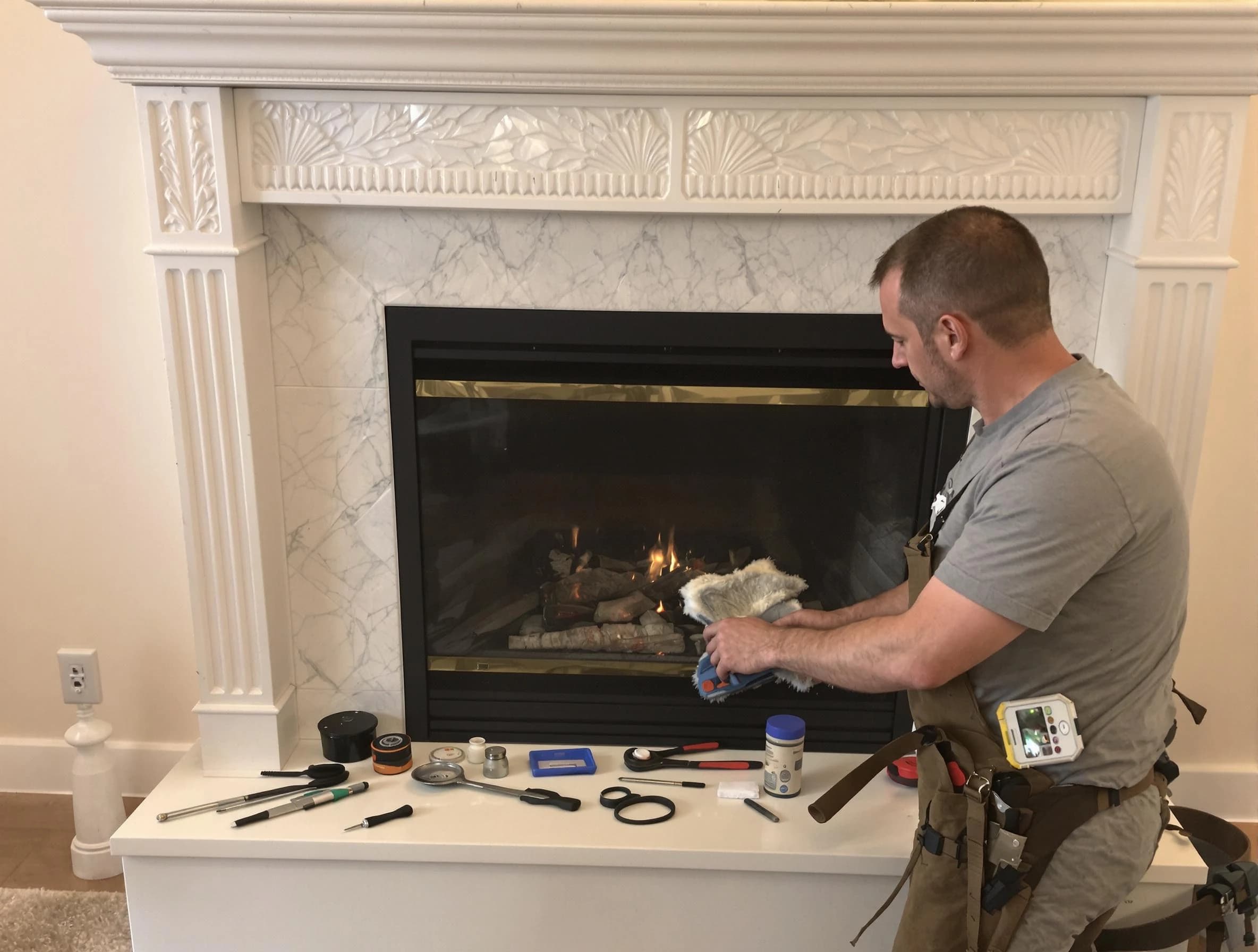 Centerville Chimney Sweep performing fireplace maintenance in Centerville, UT